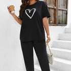 Conjunto deportivo para mujer con estampado de corazones. Talla grande. 