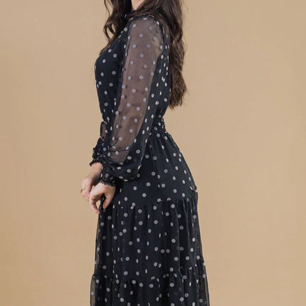 Vestido de tres niveles en tul de lunares.