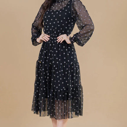 Vestido de tres niveles en tul de lunares.