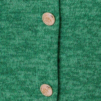 Vestido tubo de manga larga en tejido de punto de color verde.